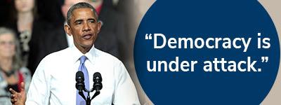[Barack Obama:"Democracy is under attack."]